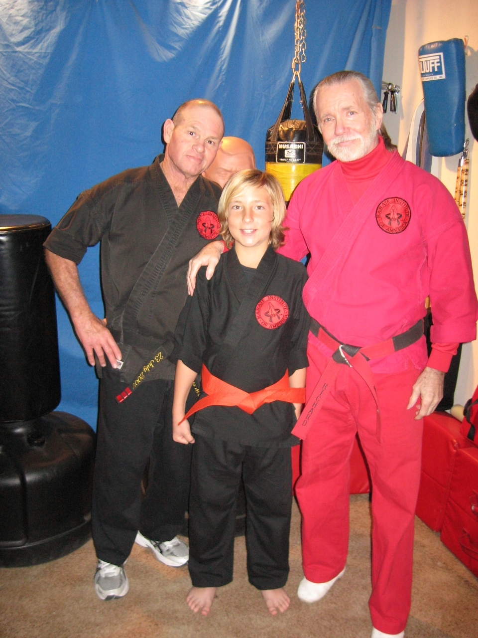 Jake &ldquo;Achilles&rdquo; Dale, flanked by Kim &ldquo;Cultivator&rdquo; Thomas (left) and Grandmaster Richard &ldquo;Whitefire&rdquo; King (right).