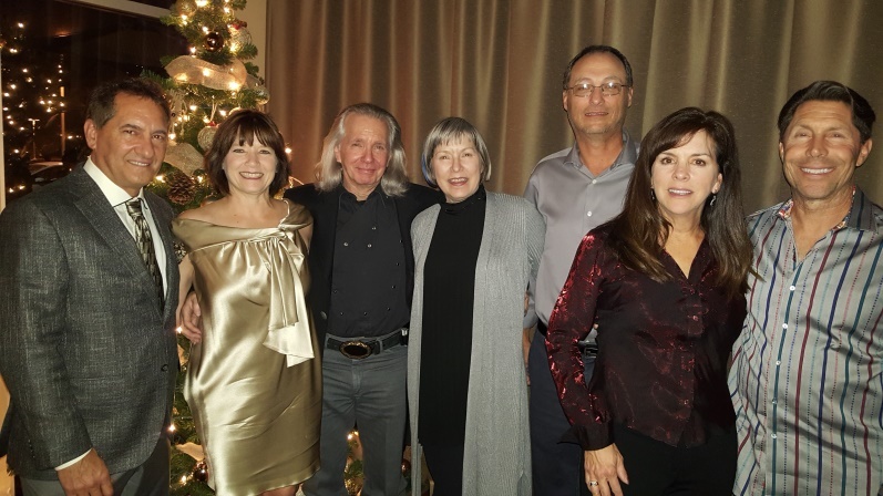 From left to right are: Laura Vertun (wearing the gold dress), Dawn Alston (wearing the full body gray sweater), and Gwen Hyman (wearing the red blouse).