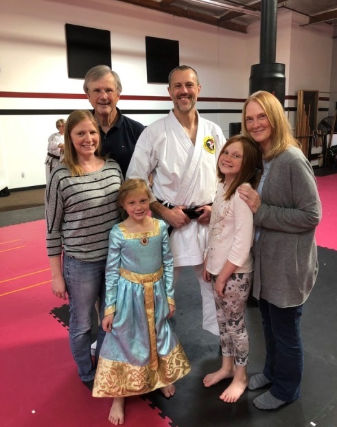 Chris poses with Mr. and Mrs. Grau, his wife Christa and daughters Kaylee and Brenna. Nice family photo in a happy moment!