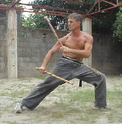 Right out of &ldquo;Central Casting.&rdquo; Practicing escrima—Filipino stick-fighting.