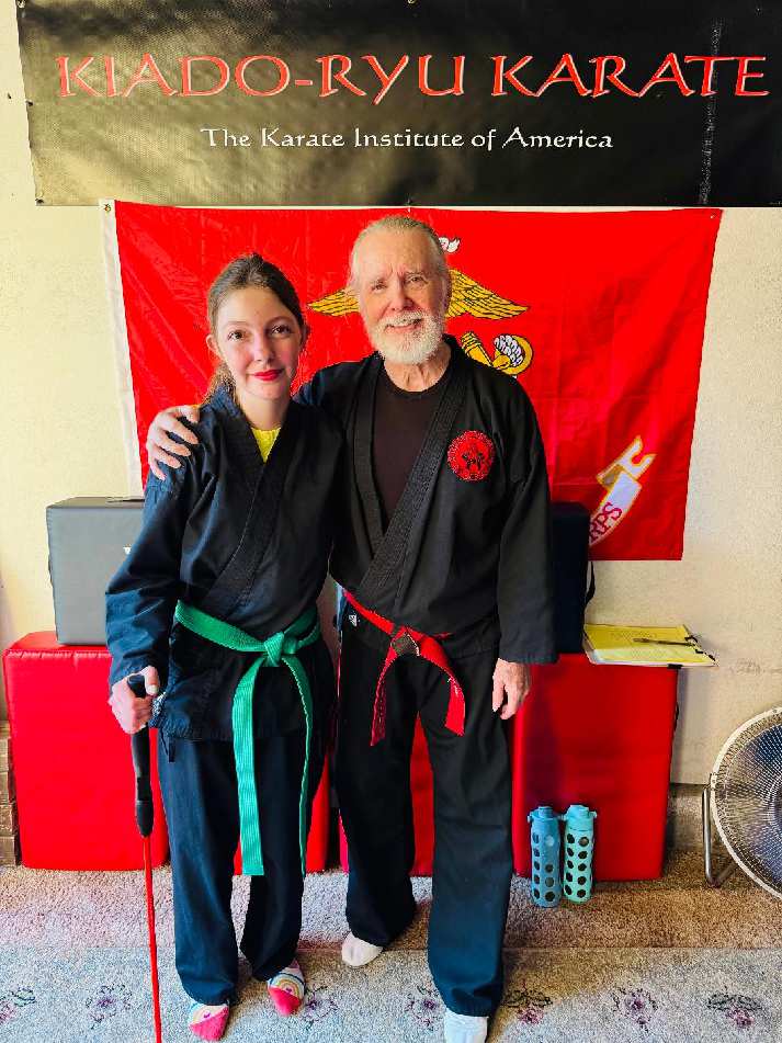 Trixie before beginning her 1ˢᵗ Dan Brown Belt test. She passed with flying colors!